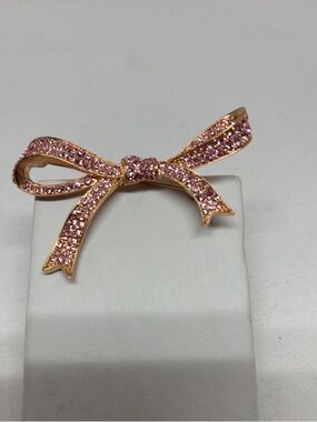 Kenneth Jay Lane Pink Rhinestone Bow Brooch in Pink Gold